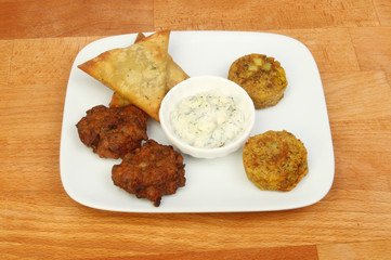 Indian snack selection on a tabletop