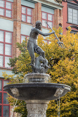 Historic Neptune Fountain, located at Long Market Street (Long Lane), in front of old buildings and...
