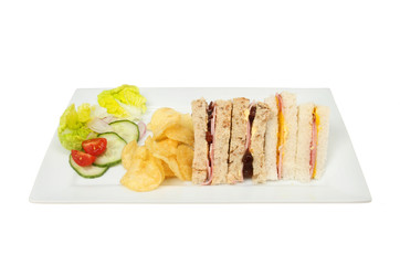 Sandwiches crisps and salad