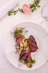 An edge from beef with cabbage a grill, the fried onions on a grill
