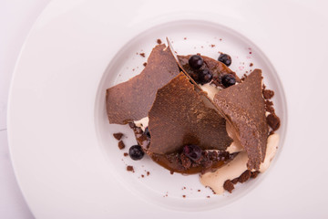 A caramel pudding with ice cream and salty caramel 