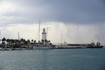 Fototapeta premium Lighthouse in rainy sky