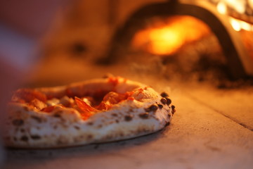 Neapolitan pizza in a wood stove