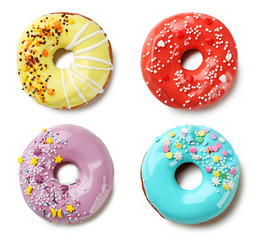 Collage of donuts with sprinkles on a white background