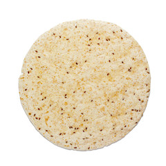 Wheat tortilla with seeds of cereals on white isolated background