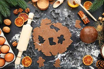 Baking christmas cookies on wooden table