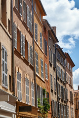 Shutters on the windows of townhouses in the city of Aix-en-Provence in France.