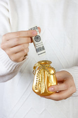 Close-up Of A Woman Holding Gift Box Of Dollar