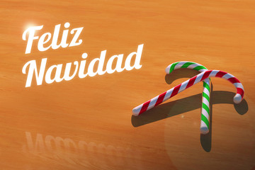 Feliz Navidad with Candy Canes on Wooden Table Greeting Card