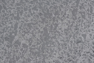 Drops of water on a gray surface