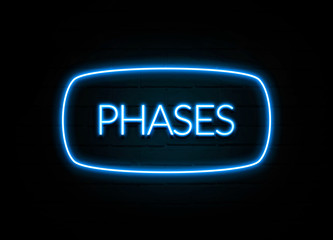 Phases  - colorful Neon Sign on brickwall