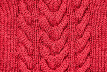 Red knitted texture. Background