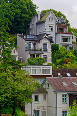 Fototapeta na wymiar Villas in so-called Treppenviertel (lit. stairs quarter), Hamburg Blankenese, Germany