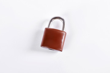 Brown padlock on white background. New lock isolated on white background. Security and protection concept.