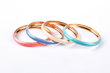 Naklejka premium Four fashion color bracelets. Set of female modern bracelets isolated on white background. Woman fashion accessories.