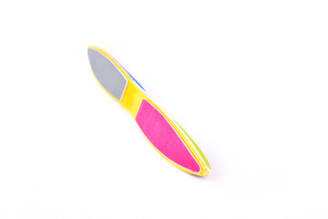 Colorful nail file, white background. Two-colour file for nails isolated on white background. Instrument for nail beauty salon.
