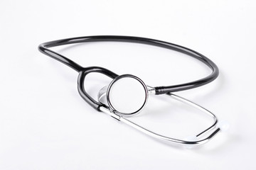 Stethoscope for heartbeat measurement. Black medical stethoscope isolated on white background.