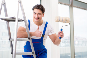 Painter repairman working at construction site