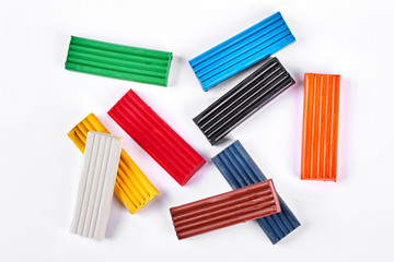 Fototapeta premium Multicolor bricks of kids plasticine. Childrens colorful plasticine for creativity in kindergarten.