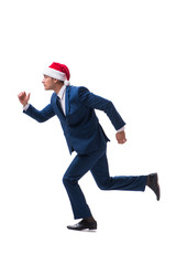 Young busnessman wearing santa hat in christmas concept on white