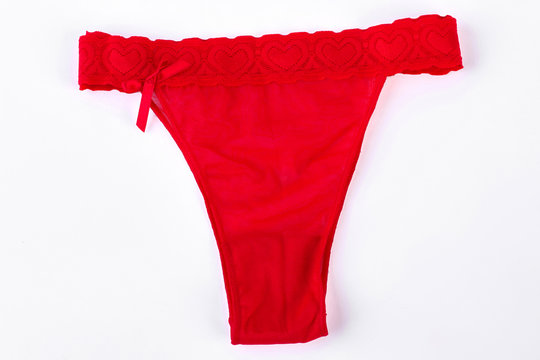 Red female lace hearts pantie. High quality cloth, lingerie. Beautiful undewear clothing isolated on white background.