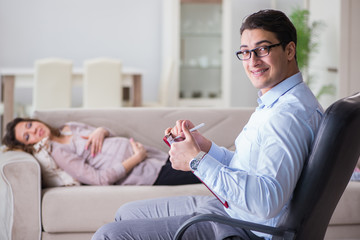 Pregnant woman visiting psychologist doctor