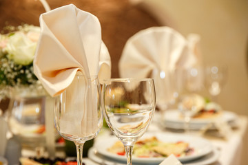 Wine or champagne glasses on table, catering service concept, alcohol party with alcoholic drinks. Luxury life