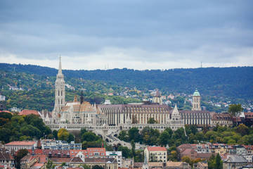 Fototapeta na wymiar Cityscape of Budapest, Fisherman's Bastion and beautiful hills, Hungary. Old european town