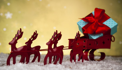 Obraz na płótnie Canvas Christmas, Santa sleigh on gift box background 