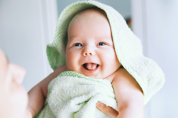 Cutest baby after bath with towel on head.