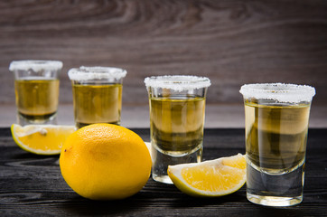 Tequila drink served in glasses with lime and salt
