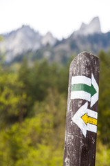 Signpost on the mountain path, shows the right hiking direction