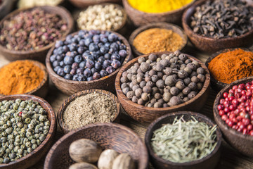 Colorful spices on the wooden table