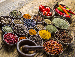 Colorful spices on the wooden table