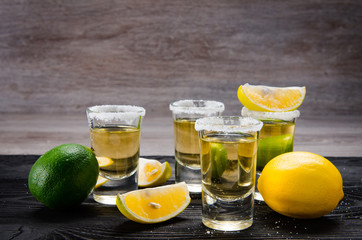 Tequila drink served in glasses with lime and salt