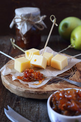 Onion and apple chutney confiture with solid cheese