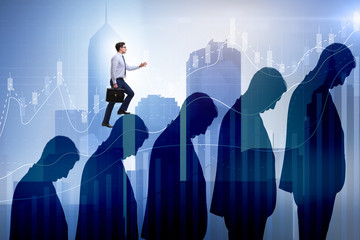 Business people climbing career ladder in business concept