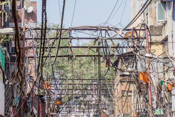 Chaotic mess of electric cables in the center of Delhi, India