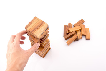 blocks wood game (jenga) on white background.