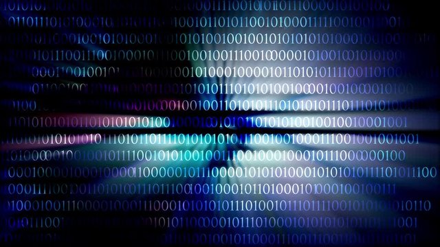 Screen with an eye made of binary code
