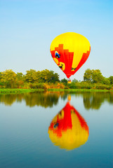 Balloons over the river . Composition of nature and blue sky background at Ayutthaya , thailand