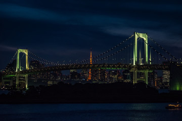 Rainbow bridge and Tokyo tower at night