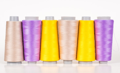 Vary colored thread coils