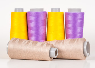 Vary colored thread coils