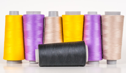 Vary colored thread coils