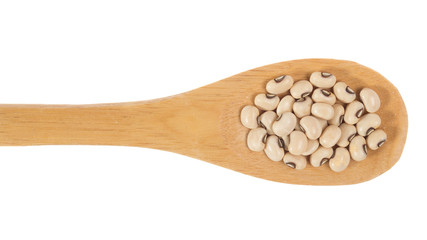 Grains over wooden bamboo spoon. Isolated, White background.