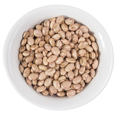 Top view of grains on ceramics bowl.