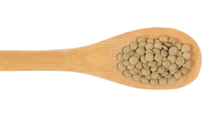 Grains over wooden bamboo spoon. Isolated, White background.
