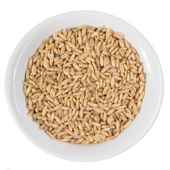 Top view of grains on ceramics bowl.