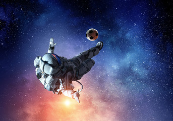 Astronaut play soccer game